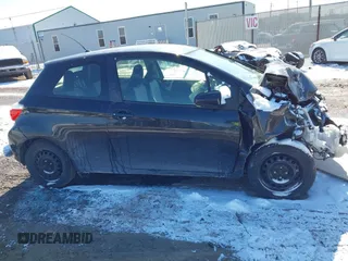 2012 Toyota Yaris L with VIN JTDJTUD33CD520102, listed as a IAAI auction lot 41621530 with 133,144 mi miles. Bid and sale history available at carsss.com. Image 14.