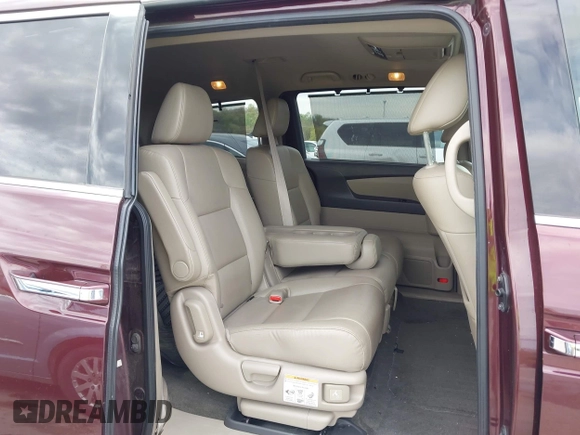2014 Honda Odyssey Touring with VIN 5FNRL5H9XEB073156, listed as a IAAI auction lot 41990714 with 166,129 mi miles and . Bid and sale history available at DreamBid. Image 8.