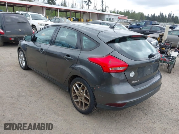 2015 Ford Focus SE with VIN 1FADP3K26FL269811, listed as a IAAI auction lot 42148333 with 157,192 mi miles. Bid and sale history available at carsss.com. Image 3.