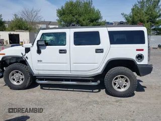 2006 Hummer H2 with VIN 5GRGN23U86H104660, listed as a IAAI auction lot 41933116 with 165,734 mi miles. Bid and sale history available at carsss.com. Image 14.