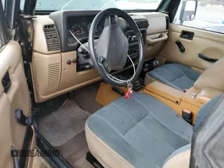 2002 Jeep Wrangler Sahara with VIN 1J4FA59S42P742978, listed as a Copart auction lot 46707685 with 77,272 mi miles and Salvage Title. Bid and sale history available at carsss.com. Image 8.