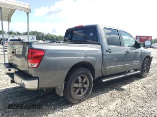 2014 Nissan Titan SV with VIN 1N6BA0ED0EN517002, listed as a Copart auction lot 57885435 with 139,910 mi miles and Salvage title. Bid and sale history available at DreamBid. Image 3.