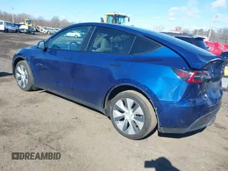 2021 Tesla Model Y Long Range with VIN 5YJYGDEE8MF293230, listed as a IAAI auction lot 41744033 with 56,797 mi miles and . Bid and sale history available at DreamBid. Image 3.