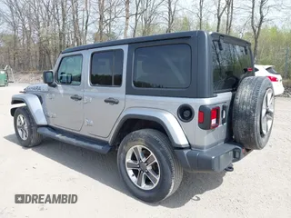 2018 Jeep Wrangler Unlimited Sahara with VIN 1C4HJXEG4JW141540, listed as a IAAI auction lot 42148402 with 43,909 mi miles and . Bid and sale history available at DreamBid. Image 3.