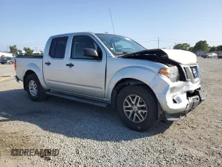 2017 Nissan Frontier SV with VIN 1N6AD0ER9HN711689, listed as a Copart auction lot 61513245 with 51,994 mi miles and Salvage title. Bid and sale history available at DreamBid. Image 4.