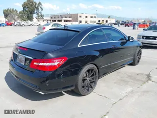 2011 Mercedes-Benz E-Class E 550 with VIN WDDKJ7CB8BF078706, listed as a IAAI auction lot 41892595 with 159,923 mi miles. Bid and sale history available at carsss.com. Image 4.