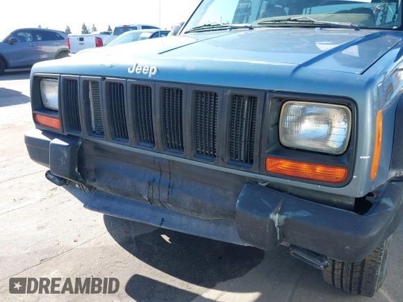 1998 Jeep Cherokee Sport with VIN 1J4FT68S0WL231959, listed as a IAAI auction lot 41680076 with 252,369 mi miles. Bid and sale history available at carsss.com. Image 6.