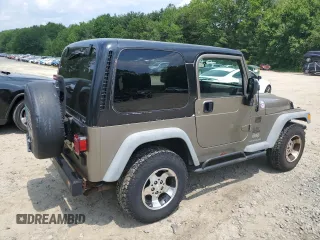 2004 Jeep Wrangler SE with VIN 1J4FA29164P797604, listed as a Copart auction lot 59978155 with 166,888 mi miles and Clean title. Bid and sale history available at DreamBid. Image 3.
