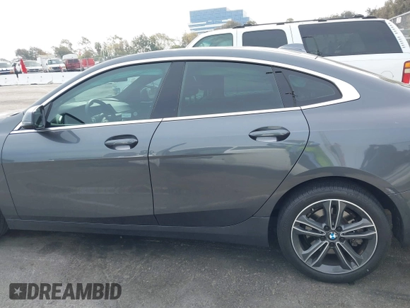 2021 BMW 2 Series 228i with VIN WBA53AK03M7J11216, listed as a IAAI auction lot 41688822 with 22,367 mi miles and . Bid and sale history available at carsss.com. Image 14.