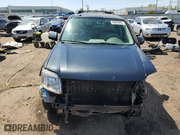 2010 Mercury Mariner Premier с VIN 4M2CN9H78AKJ26918, выставлен на аукционе Copart как лот 56000095 с пробегом 195 357 миль миль и Списание • Salvage title. История ставок и продаж доступна на DreamBid. Изображение 5.