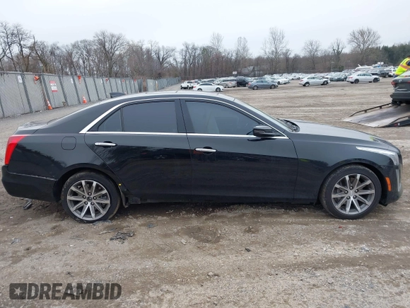 2016 Cadillac CTS Luxury Collection AWD with VIN 1G6AX5SS9G0194228, listed as a IAAI auction lot 41504476 with 94,573 mi miles and . Bid and sale history available at DreamBid. Image 12.