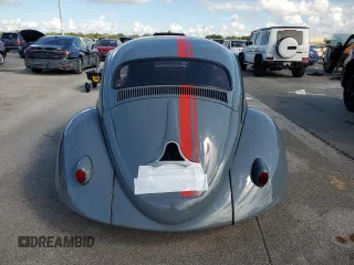 1965 Volkswagen Beetle with VIN 115467066, listed as a Copart auction lot 74195744 with Not Provided miles and Salvage Title. Bid and sale history available at DreamBid. Image 6.