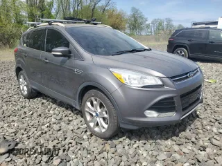 2013 Ford Escape SEL z VIN 1FMCU9HX6DUB05689, wystawiony jako Copart lot #55148765 z przebiegiem 69 178 mil mil oraz Czysty tytuł • Clean title. Historia ofert i sprzedaży dostępna na DreamBid. Obrazek 4.