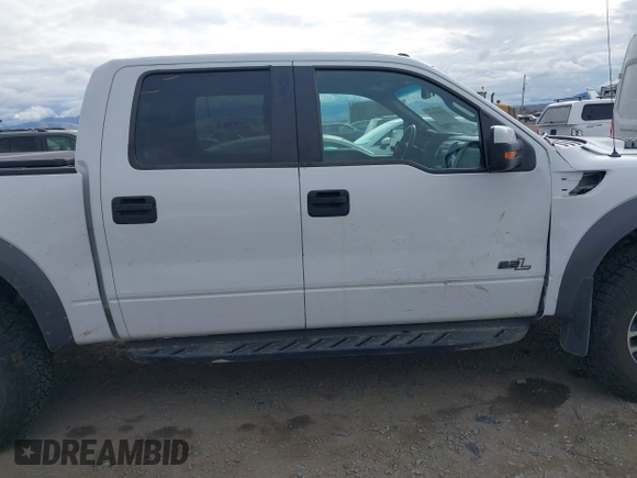 2014 Ford F-150 SVT Raptor with VIN 1FTFW1R62EFC00548, listed as a IAAI auction lot 40706960 with 71,590 mi miles and . Bid and sale history available at carsss.com. Image 13.