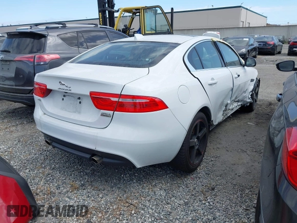 2019 Jaguar XE 25t with VIN SAJAS4FX3KCP52756, listed as a IAAI auction lot 41826575 with 71,252 mi miles. Bid and sale history available at carsss.com. Image 4.