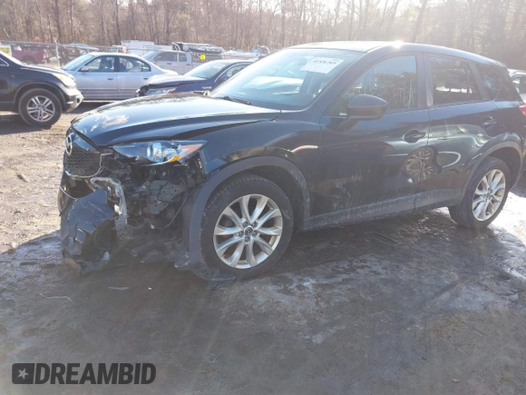 2014 Mazda CX-5 Grand Touring with VIN JM3KE4DY1E0303658, listed as a IAAI auction lot 41536769 with 158,777 mi miles. Bid and sale history available at carsss.com. Image 16.