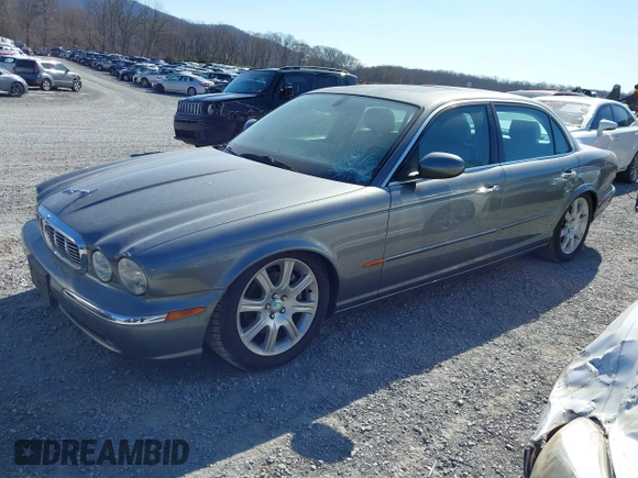 2005 Jaguar XJ with VIN SAJWA79C85SG48974, listed as a IAAI auction lot 41844684 with 154,145 mi miles. Bid and sale history available at carsss.com. Image 2.