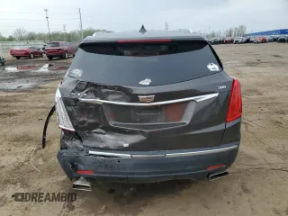 2019 Cadillac XT5 Luxury FWD with VIN 1GYKNCRSXKZ132871, listed as a Copart auction lot 54879405 with 57,325 mi miles and Salvage title. Bid and sale history available at DreamBid. Image 6.