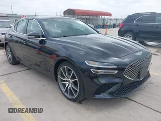 2023 Genesis G70 2.0T z VIN KMTG34TAXPU125643, wystawiony jako IAAI lot #42120428 z przebiegiem 31 082 mil mil oraz . Historia ofert i sprzedaży dostępna na DreamBid. Obrazek 1.