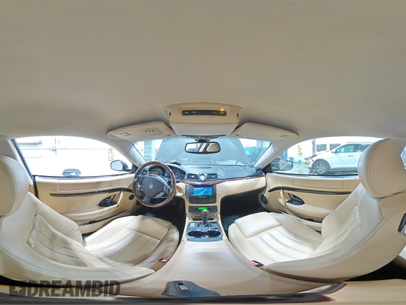 2009 Maserati GranTurismo с VIN ZAMGJ45A190042805, выставлен на аукционе Copart как лот 70785674 с пробегом 71 810 миль миль и Списание • Salvage title. История ставок и продаж доступна на DreamBid. Изображение 12.