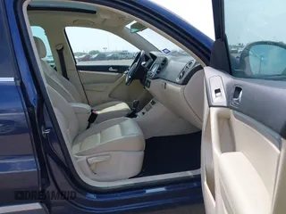 2012 Volkswagen Tiguan SEL with VIN WVGAV7AX8CW536752, listed as a IAAI auction lot 41798619 with 128,223 mi miles and . Bid and sale history available at DreamBid. Image 5.