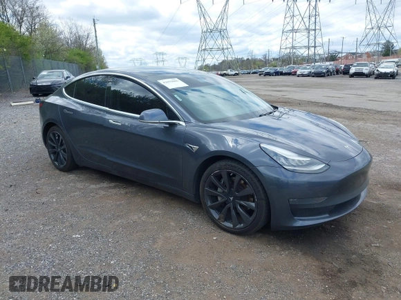 2020 Tesla Model 3 Long Range with VIN 5YJ3E1EB2LF646449, listed as a IAAI auction lot 42059086 with 120,981 mi miles and . Bid and sale history available at DreamBid. Image 1.