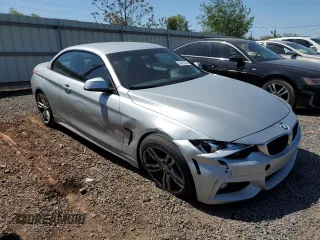 2014 BMW 4 Series 428i xDrive with VIN WBA3T1C58EP819710, listed as a Copart auction lot 54699235 with 196,856 mi miles and Salvage Title. Bid and sale history available at carsss.com. Image 4.