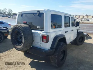 2023 Jeep Wrangler Willys with VIN 1C4HJXDG0PW638871, listed as a IAAI auction lot 42700599 with 16,171 mi miles and . Bid and sale history available at DreamBid. Image 4.