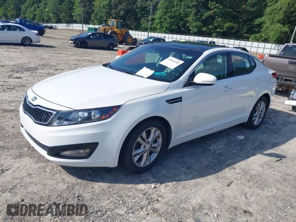 2013 Kia Optima EX with VIN 5XXGN4A79DG105157, listed as a IAAI auction lot 42496945 with 119,000 mi miles and . Bid and sale history available at DreamBid. Image 2.