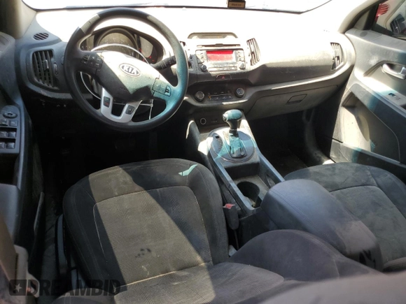 2012 Kia Sportage LX with VIN KNDPB3A25C7345952, listed as a Copart auction lot 57830015 with 101,757 mi miles and Salvage title. Bid and sale history available at DreamBid. Image 8.