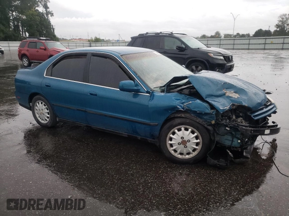 1995 Honda Accord LX with VIN 1HGCD5631SA066149, listed as a Copart auction lot 73461324 with 196,561 mi miles and Salvage Title. Bid and sale history available at DreamBid. Image 4.