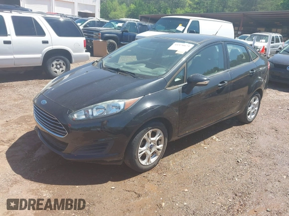 2015 Ford Fiesta SE with VIN 3FADP4BJ9FM113645, listed as a IAAI auction lot 41970671 with 138,026 mi miles. Bid and sale history available at carsss.com. Image 2.