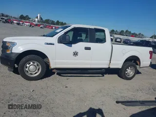 2015 Ford F-150 XL with VIN 1FTEX1C86FFB98582, listed as a IAAI auction lot 41678059 with 76,424 mi miles. Bid and sale history available at carsss.com. Image 14.