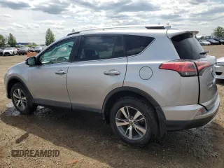 2016 Toyota RAV4 XLE with VIN 2T3RFREV9GW439315, listed as a Copart auction lot 59704345 with 143,198 mi miles and Salvage title. Bid and sale history available at DreamBid. Image 2.