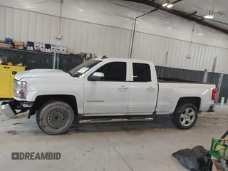 2018 Chevrolet Silverado 1500 LT with VIN 1GCRCREC0JZ204834, listed as a IAAI auction lot 41363579 with 135,247 mi miles and . Bid and sale history available at DreamBid. Image 14.