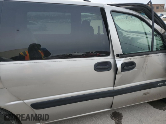 2004 Chevrolet Venture LS z VIN 1GNDX03E44D179265, wystawiony jako Copart lot #82254644 z przebiegiem Nie podano mil oraz Szkody całkowita. Historia ofert i sprzedaży dostępna na DreamBid. Obrazek 11.