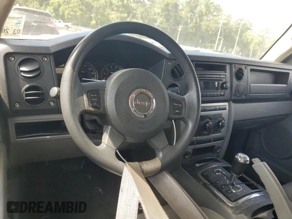 2006 Jeep Commander with VIN 1J8HH48KX6C203308, listed as a Copart auction lot 64456765 with 185,794 mi miles and Salvage title. Bid and sale history available at DreamBid. Image 8.
