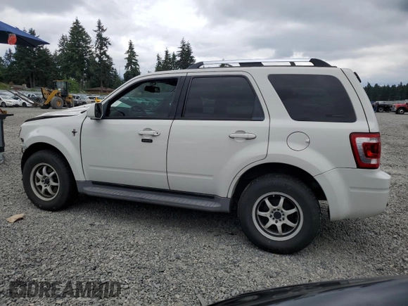 2010 Ford Escape Limited with VIN 1FMCU9EG5AKA70316, listed as a Copart auction lot 62413205 with 106,936 mi miles and Salvage title. Bid and sale history available at DreamBid. Image 2.