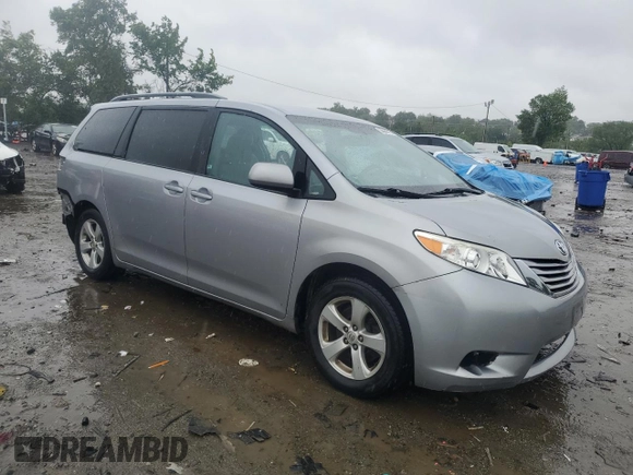 2015 Toyota Sienna LE AAS with VIN 5TDKK3DC5FS550258, listed as a Copart auction lot 58069915 with 138,260 mi miles and Salvage title. Bid and sale history available at DreamBid. Image 4.