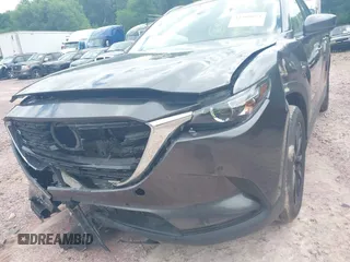 2022 Mazda CX-9 Touring Plus with VIN JM3TCBAY2N0611876, listed as a IAAI auction lot 42369073 with 37,639 mi miles and . Bid and sale history available at DreamBid. Image 6.
