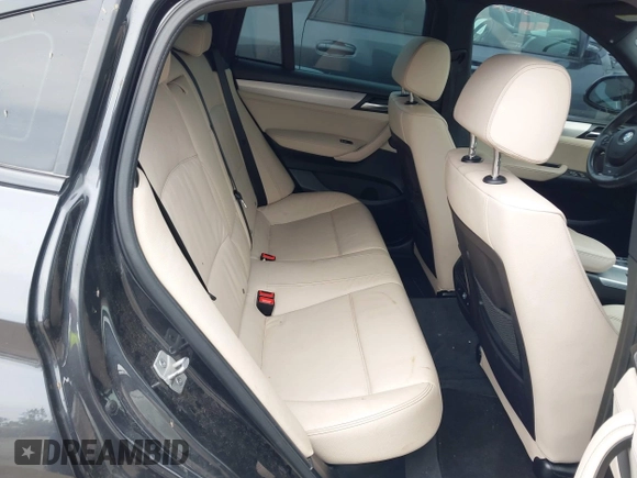 2015 BMW X4 xDrive28i with VIN 5UXXW3C54F0M88740, listed as a IAAI auction lot 42275157 with 159,281 mi miles and . Bid and sale history available at DreamBid. Image 8.