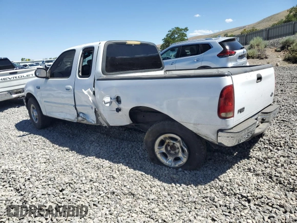 2001 Ford F-150 XL with VIN 1FTZX17251NB12930, listed as a Copart auction lot 62517295 with Not provided miles and Salvage title. Bid and sale history available at DreamBid. Image 2.