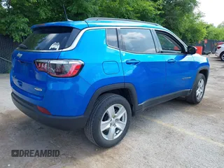 2022 Jeep Compass Latitude z VIN 3C4NJDBB6NT175193, wystawiony jako IAAI lot #42503821 z przebiegiem 58 934 mil mil oraz . Historia ofert i sprzedaży dostępna na DreamBid. Obrazek 4.