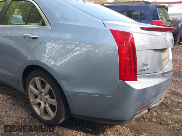 2013 Cadillac ATS with VIN 1G6AA5RA7D0141165, listed as a IAAI auction lot 42146986 with 127,688 mi miles and . Bid and sale history available at DreamBid. Image 6.
