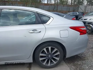 2017 Nissan Altima S z VIN 1N4AL3AP4HC288839, wystawiony jako IAAI lot #42162440 z przebiegiem 222 000 mil mil oraz . Historia ofert i sprzedaży dostępna na DreamBid. Obrazek 21.