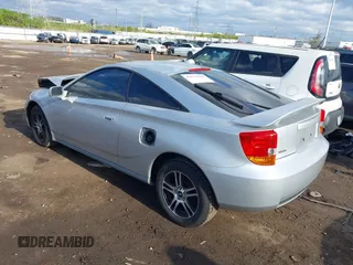 2002 Toyota Celica GT with VIN JTDDR32T120140349, listed as a IAAI auction lot 42037609 with 165,177 mi miles. Bid and sale history available at carsss.com. Image 3.