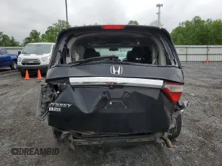 2013 Honda Odyssey EX-L with VIN 5FNRL5H69DB031498, listed as a Copart auction lot 55459745 with 129,773 mi miles and Salvage title. Bid and sale history available at DreamBid. Image 6.