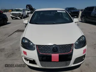 2007 Volkswagen GTI z VIN WVWEV71KX7W104728, wystawiony jako Copart lot #51739535 z przebiegiem 219 285 mil mil oraz Czysty tytuł • Clean title. Historia ofert i sprzedaży dostępna na DreamBid. Obrazek 5.