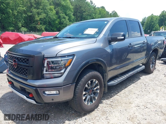 2024 Nissan Titan Pro-4X with VIN 1N6AA1ED8RN114313, listed as a IAAI auction lot 42498591 with 21,955 mi miles and . Bid and sale history available at DreamBid. Image 2.
