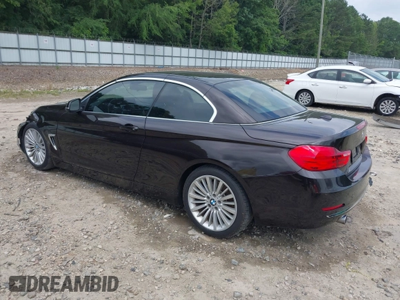 2014 BMW 4 Series 435i with VIN WBA3T3C50EJ876997, listed as a IAAI auction lot 42406299 with 115,048 mi miles and . Bid and sale history available at DreamBid. Image 3.